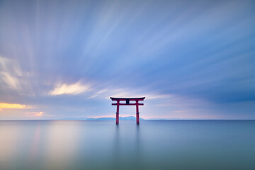 Long exposure shot of Shirahige shrine Torii gate at sunrise, Lake Biwa, Shiga Prefecture, Japan