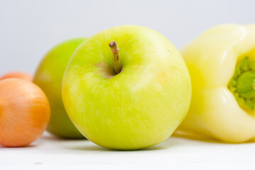 fruits and vegetables on white wood table