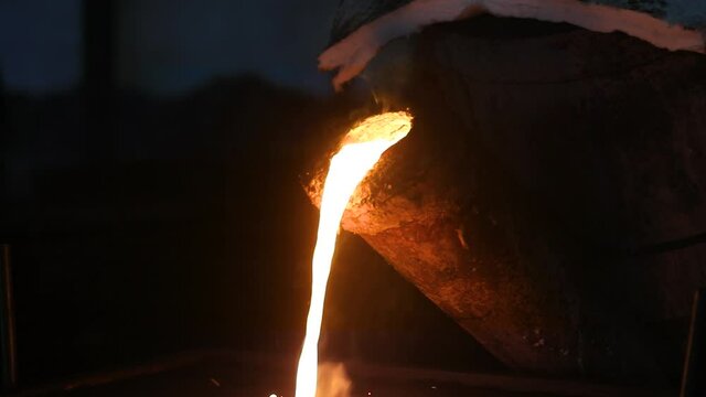 Pouring Liquid Metal On Steel