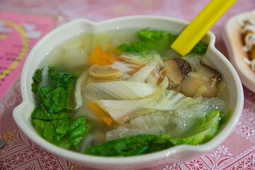 Asian noodle soup with vegetables and mushrooms, сhinese shiitake and cabbage, vegetarian dish