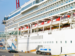 Modern cruiseship or cruise ship liner in port of Malaga, Spain during Mediterranean cruising in...