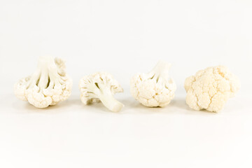 close-up of some delicious white cauliflower illustrating a healthy lifestyle isolated on white background