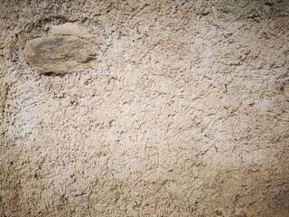 Mauer verputzt mit Narursteinen
