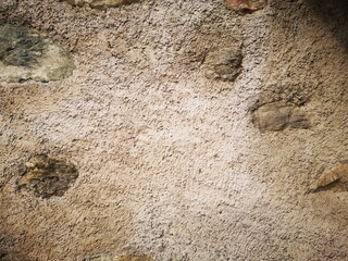 Mauer verputzt mit Narursteinen