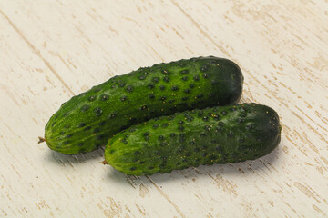 Ripe fresh green two cucumbers