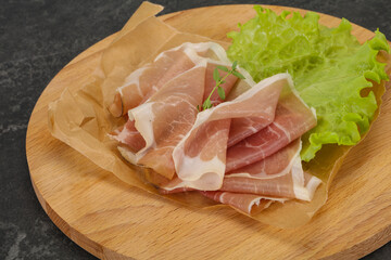 Italian prosciutto pork meat over board