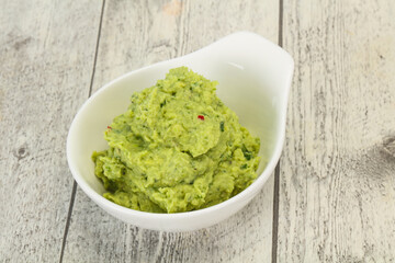 Avocado guacamole sauce with chili pepper