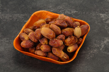 Sweet tasty dry dates in the basket