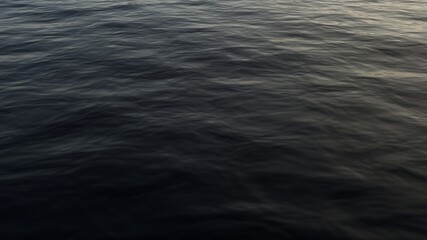 Photo of the water at sea at sunset. Dark deep water.