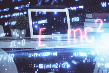 Desktop computer background and formula hologram writing. Double exposure. Education concept.