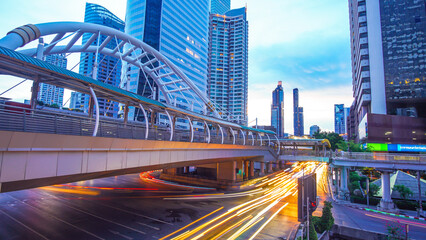 Light trails on the street at sathorn square bangkok thailand.