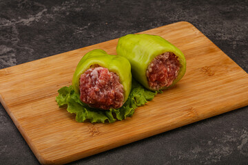 Raw stuffed pepper for cooking