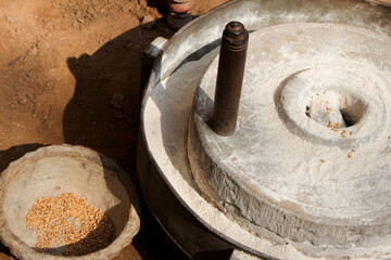 Hard stone wheel used in villages for grinding wheat  and other grain seeds