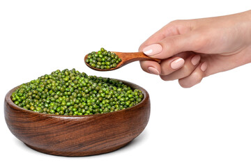 A heap of Mung bean in wooden bowl with wooden spoon in hand
