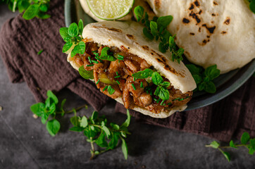 Homemade pita bread with meat and herbs