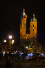 Naklejka na ściany i meble Krakow, Poland - July 03, 2016: View Of The Main Square And Krakow Cloth Hall In The Night
