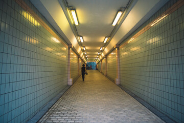 Long corridor in the subway station.