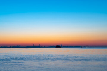 Fototapeta na wymiar Dawn and sky at sea
