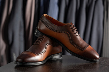 Elegant leather male shoes in the shop. expensive modern shoes for men