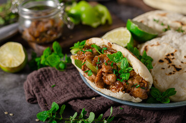 Homemade pita bread with meat and herbs