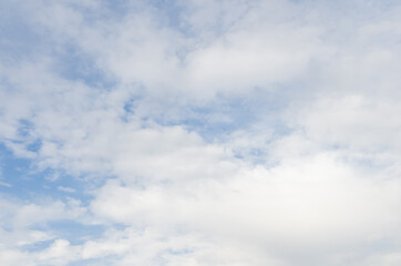 white fluffy clouds in the blue sky, Blue sky background with tiny clouds