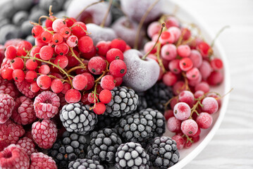 assorted frozen berries on a white plate