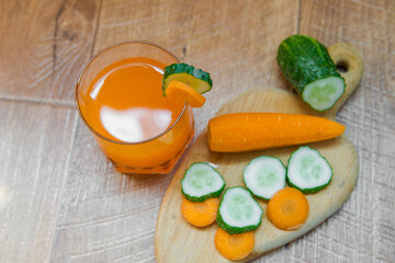 Sliced carrots and cucumbers. Carrot juice. Healthy Eating, Healthy Breakfast