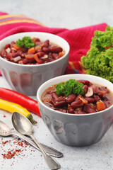 Two bowls with traditional Georgian dish - lobio