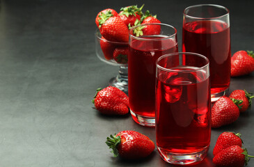 Glasses with strawberry drink with ice