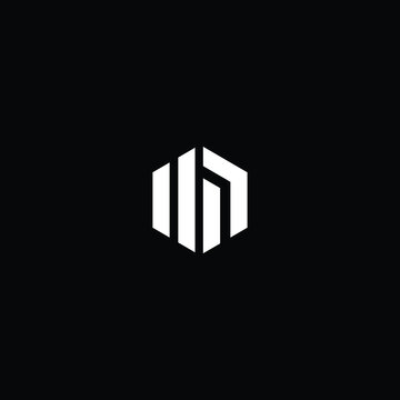 Minimal elegant monogram art logo. Outstanding professional trendy awesome artistic MD DM initial based Alphabet icon logo. Premium Business logo white color on black background