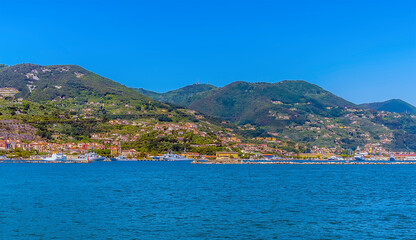 Naklejka na ściany i meble A panorama view towards Marola, adjacent to La Spezia, Italy in the summertime