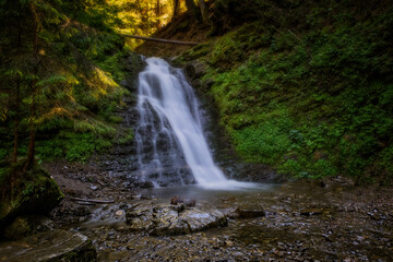 Fototapeta premium Sopit or Sopot waterfall is located in Ukrainian Carpathians at the summer times, july 2020. Long exposure shot.