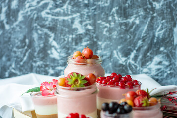 panna cotta berry fitness dessert - three layers of milk jelly pudding, coffee, vanilla and berry -...