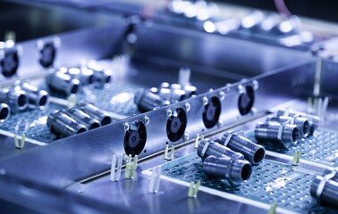 Close-up metal nuts and cylinders