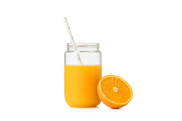 orange juice in glass jar isolated on white background.