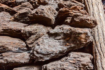 Dry charcoal pile stacked in basement