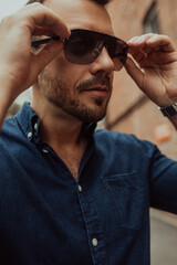 Obraz premium Portrait of young man with sunglasses.