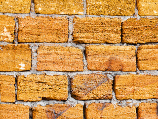 Abstract old stone wall with cracks and scratches. Landscape style. Great background or texture.