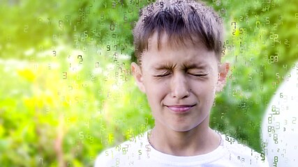 A boy on a green natural background with his eyes closed, frowns and winces, and numbers fly away from him. The concept of accounts.