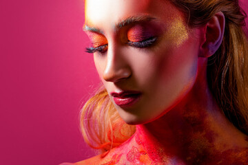 Obraz premium Bright makeup and face art, close-up portrait. Creative makeup,