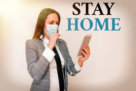 Handwriting text writing Stay Home Save Lives. Conceptual photo lessen the number of infected patients by not leaving the house Promoting health awareness with set of medical precautionary equipment - Powered by Adobe