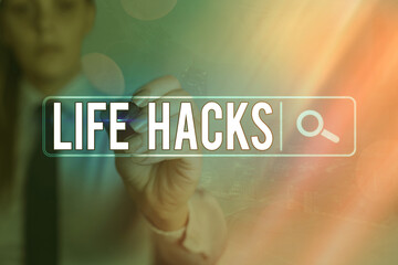 Writing note showing Life Hacks. Business concept for strategy or technique adopted to manage...