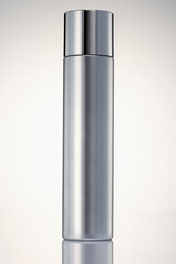 silver colored steel cosmetic container.