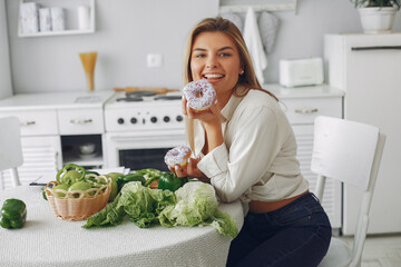 Healthy eating. Dieting and people concept. Blonde with a vegetable.