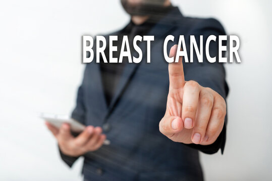Text sign showing Breast Cancer. Business photo showcasing disease in which cells in the breast grow out of control Model with pointing hand finger symbolizing navigation progress growth