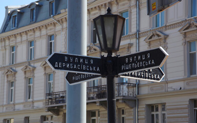 Odessa. Ukraine. 06.30.20. Old lantern with traffic signs in the city center.