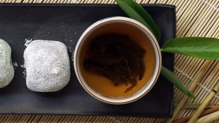 Traditional Japanese confectionery dessert Daifuku Mochi, Daifuku means great luck is made of round mochi or glutinous rice cake stuffed with sweeten red bean paste made from azuki beans, served with 