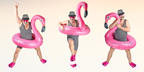 Cheerful man in a striped suit posing isolated over pink wall background holding flamingo rubber...