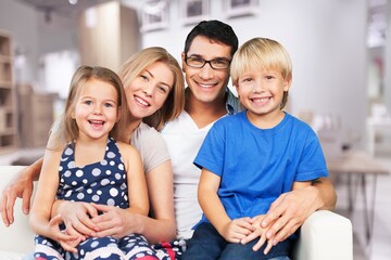 Beautiful smiling lovely family at home