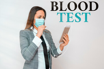 Handwriting text writing Blood Test. Conceptual photo Extracted blood sample from an organism to...